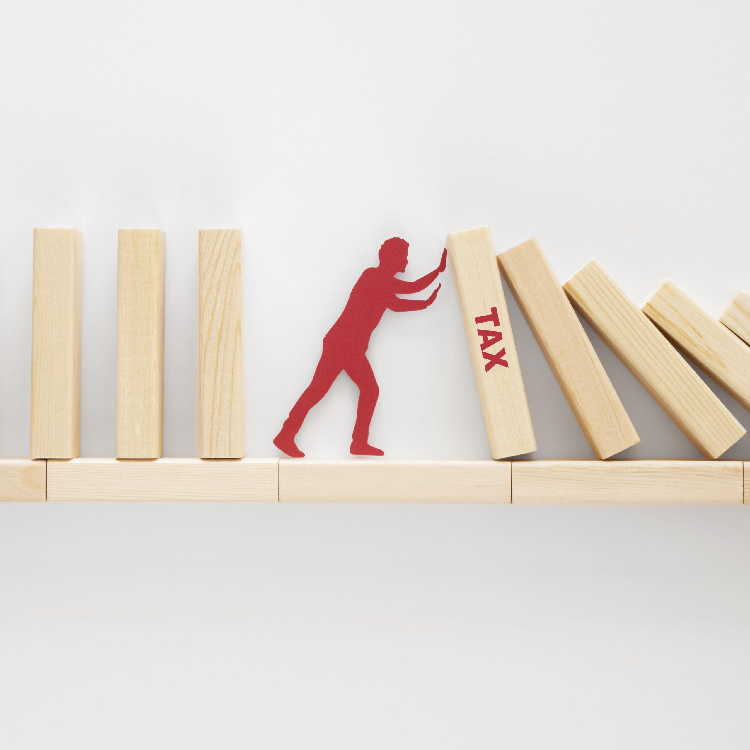 abstract representation financial crisis with wooden pieces
